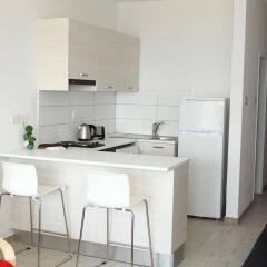 Апартаменты Anemos Apartments в номере фото 2