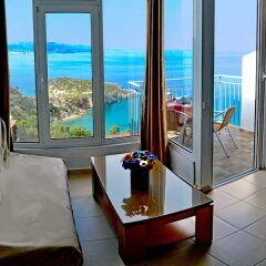 Апартаменты Kounenos Apartments комната для гостей
