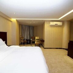 Отель Jinxing Holiday Hotel - Zhongshan Китай, Чжуншань - отзывы, цены и фото номеров - забронировать отель Jinxing Holiday Hotel - Zhongshan онлайн комната для гостей фото 3