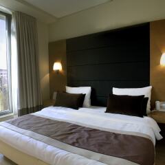 Отель B-aparthotel Grand Place комната для гостей