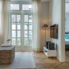 Апартаменты Nieuwmarkt Waag apartments комната для гостей фото 5