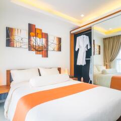 Апартаменты Cosy Beach View Luxury Apartments Паттайя комната для гостей
