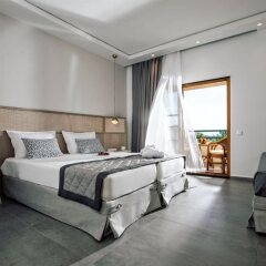 Possidi Holidays Resort & Suite Hotel комната для гостей