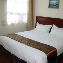 GreenTree Inn Taicang Baolong Square Hotel комната для гостей