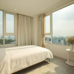 Отель M Suites by S Home Хошимин фото 4