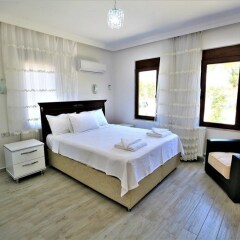 Villa Tepe by Akdenizvillam Турция, Патара - отзывы, цены и фото номеров - забронировать отель Villa Tepe by Akdenizvillam онлайн комната для гостей