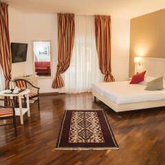 Отель Inn Rome Rooms & Suites комната для гостей фото 13
