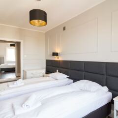 Отель Executive 3 Bedroom Apartament by Your F Польша, Варшава - отзывы, цены и фото номеров - забронировать отель Executive 3 Bedroom Apartament by Your F онлайн комната для гостей фото 2