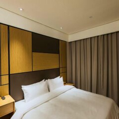 Отель JI Hotel Shanghai Hongqiao Transport Hub Linkong Zone Китай, Шанхай - отзывы, цены и фото номеров - забронировать отель JI Hotel Shanghai Hongqiao Transport Hub Linkong Zone онлайн комната для гостей