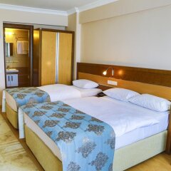 Perla Otel Турция, Дикили - отзывы, цены и фото номеров - забронировать отель Perla Otel онлайн комната для гостей