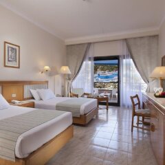 Отель Pharaoh Azur Resort Египет, Хургада - 6 отзывов об отеле, цены и фото номеров - забронировать отель Pharaoh Azur Resort онлайн комната для гостей фото 2