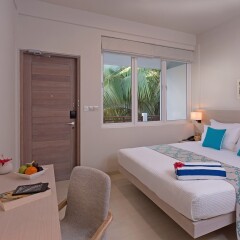 Отель Malahini Kuda Bandos Resort комната для гостей