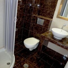 Отель Atalos Suites ванная
