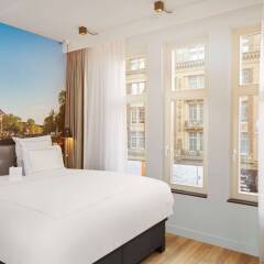 Отель Swissotel Amsterdam Амстердам комната для гостей фото 7