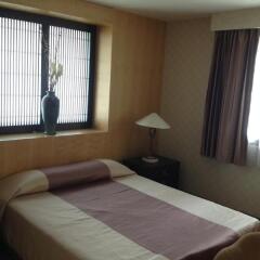 Апартаменты Gardengrove Suites Serviced Apartment Бангкок комната для гостей фото 4