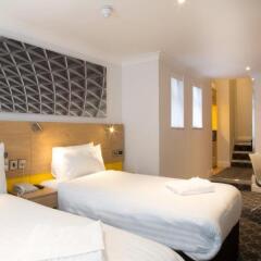 Отель Comfort Inn & Suites Kings Cross Лондон комната для гостей фото 3