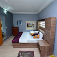 Отель Signatious Hotel and Suites Delta Нигерия, Варри - отзывы, цены и фото номеров - забронировать отель Signatious Hotel and Suites Delta онлайн комната для гостей фото 2
