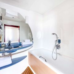 Отель Novotel Suites Paris Nord 18e ванная фото 2
