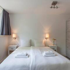 Апартаменты Tulip Apartment A комната для гостей