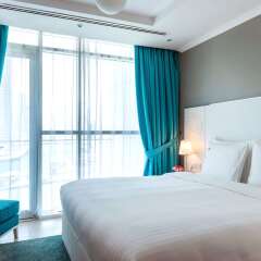 Отель Jannah Marina Bay Suites комната для гостей
