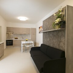 Отель Riva Azzurra Residence Римини комната для гостей