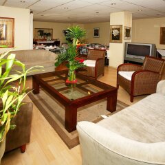 Отель Residhotel Les Coralynes Франция, Канны - 9 отзывов об отеле, цены и фото номеров - забронировать отель Residhotel Les Coralynes онлайн интерьер отеля