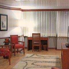 Отель Suites Perisur Apartamentos Amueblados Мексика, Мехико - отзывы, цены и фото номеров - забронировать отель Suites Perisur Apartamentos Amueblados онлайн комната для гостей фото 4