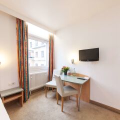 Novum Hotel München Am Hauptbahnhof Мюнхен удобства в номере фото 2