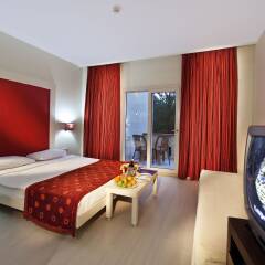 Отель Queen's Park Göynük - All Inclusive комната для гостей