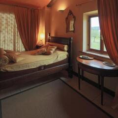 Отель Resort La Ghiaia - Guest House Сарцана сейф в номере