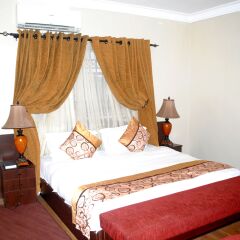 Отель Grand Inn & Suites комната для гостей