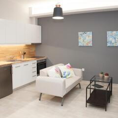 Апартаменты Omnia Pagrati Apartments в номере