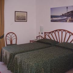 Отель Albergo Le Briciole Проччио комната для гостей