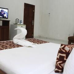 Отель Coconut Grove Beach Resort комната для гостей