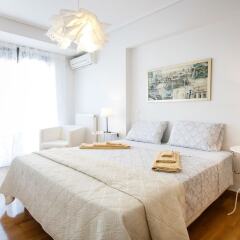 Апартаменты Modern 5thfloor Acropolis view apartment комната для гостей фото 4