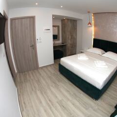 Hotel Kuburi Ксамил сейф в номере
