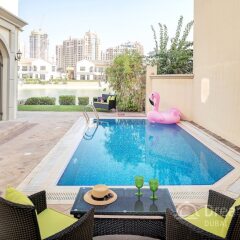 Отель Dream Inn Dubai-Luxury Palm Beach Villa бассейн