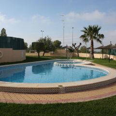 Отель Spanish Family Duplex бассейн