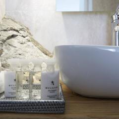 Отель Mill Houses Elegant Suites Греция, Остров Санторини - отзывы, цены и фото номеров - забронировать отель Mill Houses Elegant Suites онлайн ванная