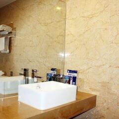 Tian Hai Chain Hotel (Jiujiang RT-Mart Jiurui Road) ванная фото 2