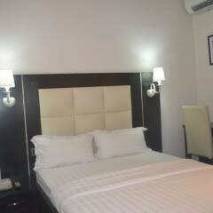 Отель Mac Dove Lounge & Suites ltd комната для гостей фото 5