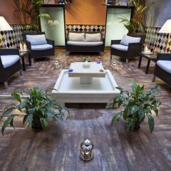 Отель Suites Gran Via 44 Apartahotel интерьер отеля