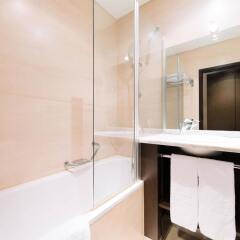 NH Geneva Airport Hotel ванная