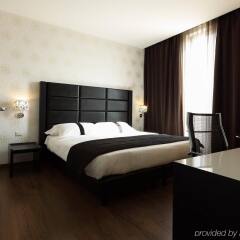 Отель Holiday Inn Genoa City, an IHG Hotel Италия, Генуя - 1 отзыв об отеле, цены и фото номеров - забронировать отель Holiday Inn Genoa City, an IHG Hotel онлайн комната для гостей