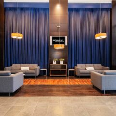 Отель Sandman Hotels & Suites Calgary West Канада, Калгари - отзывы, цены и фото номеров - забронировать отель Sandman Hotels & Suites Calgary West онлайн гостиничный бар