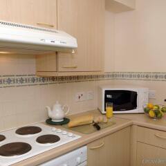 Апартаменты Fountain Court Apartments - Grove в номере