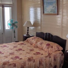 Отель DeMontevins Lodge Порт Антонио комната для гостей фото 3