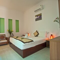 Отель Flower Garden Homestay Хойан комната для гостей фото 5