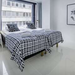 Апартаменты Kotimaailma Apartments Albertinkatu 27B комната для гостей фото 2