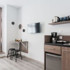 Отель Monastiraki Residences By Livin Urbban Афины в номере